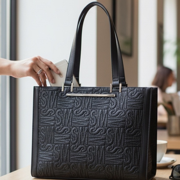 Steve Madden Handbags - Steve Madden Purse,  Embossed SM all over print, black, gold hardware